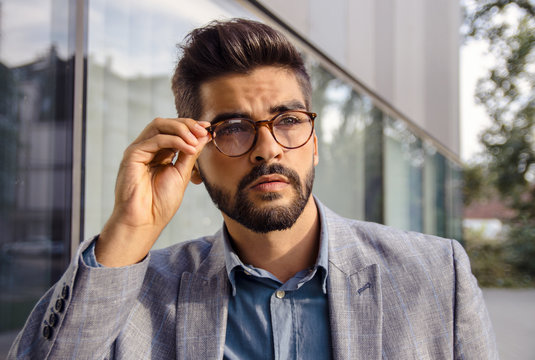 Portrait handsome elegant man with eyeglasses, closeup elegant eye wear 