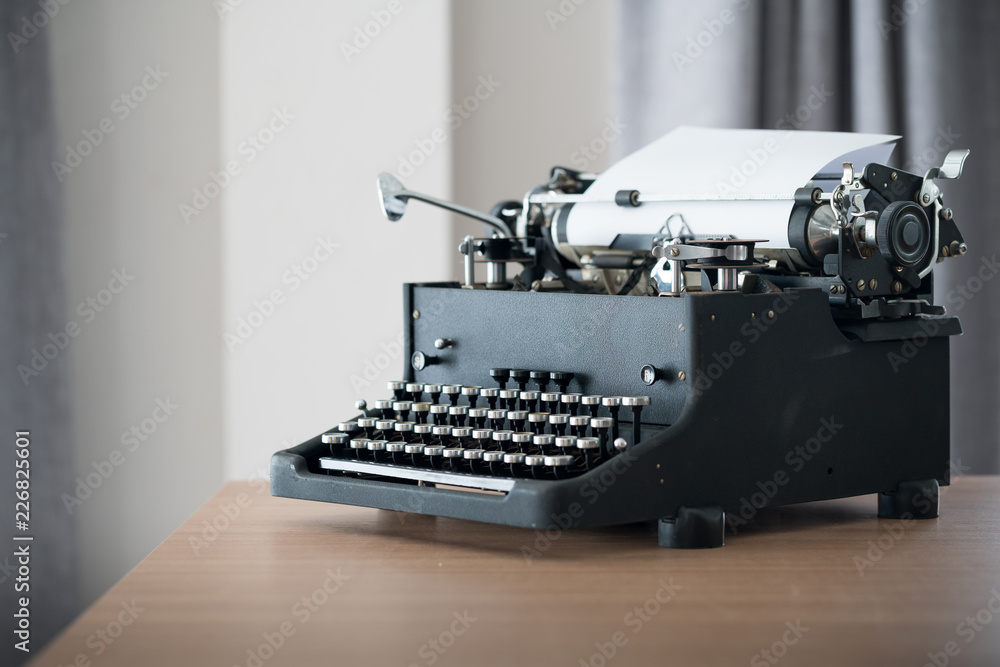 Poster retro style typewriter in studio