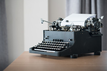 Fototapeta na wymiar Retro style typewriter in studio