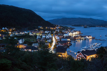 A wonderful Night shot of a city and harbor in Norway. beautiful landscape and light with sunset