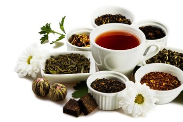 Cup of Black Tea with Dried Leaves Tea in Bowls