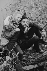 Black and white portrait of a couple walking in the fishing. Young people in love. Travel and tourism.