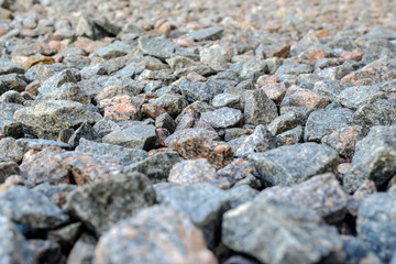 Seamless texture. Crushed granite and pebble gravel of gravel for game design.