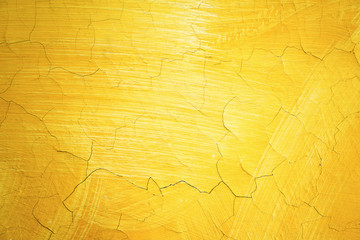 Cracked yellow paint on wall. Old exterior surface texture. Architecture concept. Text space