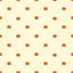 Seamless pattern with autumn maple leaves.  Orange leaves on beige background. Vector illustration