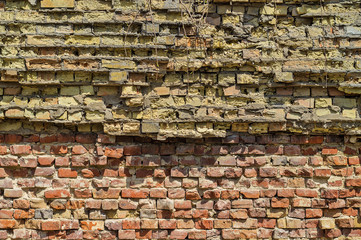 Old red and yellow brick wall background