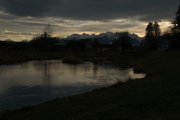 Rüthi Evening on the canal with view of Alps and Snow, Swiss Rhine valley