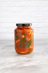 homemade green onion kimchi in a glass jar