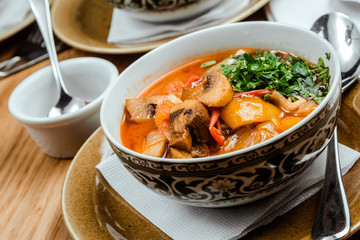 Traditional Uzbek oriental cuisine. soup with lamb meat. Copy space, selective focus