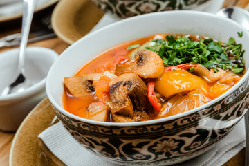 Traditional Uzbek oriental cuisine. soup with lamb meat. Copy space, selective focus