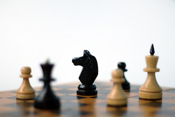 Chess pieces on board.