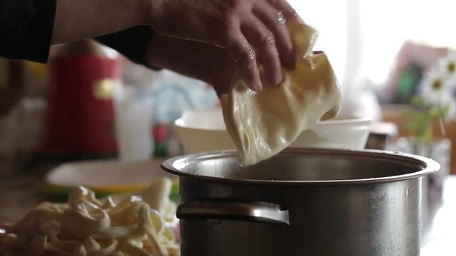 Video about cheese making. Stages of production of soft cheeses. Chechil and Burrata.