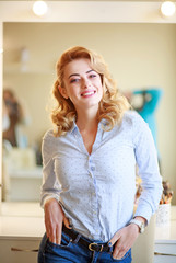 Portrait beautiful happy successful woman in home beauty hairstyle salon 