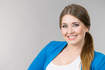 Portrait of beautiful cheerful young woman