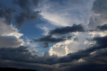 Naklejka na ściany i meble stormy clouds in the sky