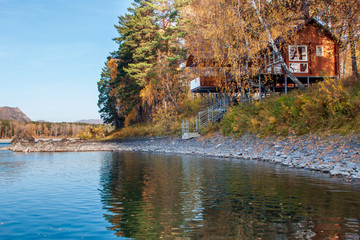 Autumn forest hunting hut landscape. Hunting hut in autumn forest. Forest hunting hut in autumn forest scene