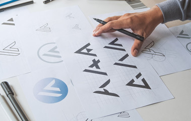 Graphic designer development process drawing sketch design creative Ideas draft Logo product...