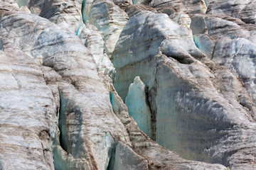 Fototapeta na wymiar Cracks in the Small Azau glacier on Mount Elbrus.
