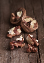 group of nuts on natural wood board