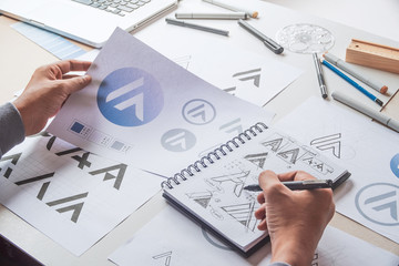 Graphic designer development process drawing sketch design creative Ideas draft Logo product...