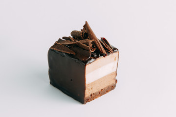 Berry Cakes on a black stone background, author's desserts and serving. Chocolate, berries and cream. The design for the website