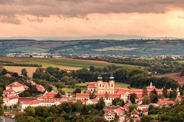 Landscape urban photography. Famous pilgrimage centre and tourist destination Velehrad, Czech Republic with its basilica and beautiful green surroundings with trees and forest.