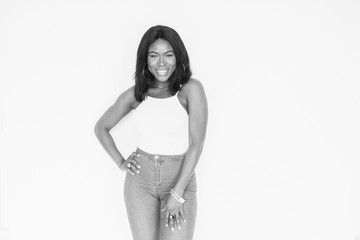 Sensual beautiful woman with afro posing in studio. Glamour makeup. black and white portrait