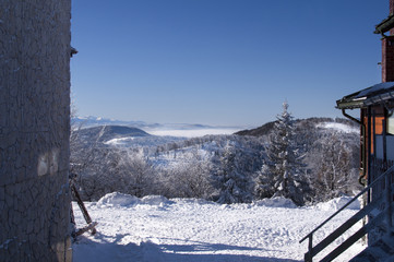Fototapeta premium winter mountains up above the clouds