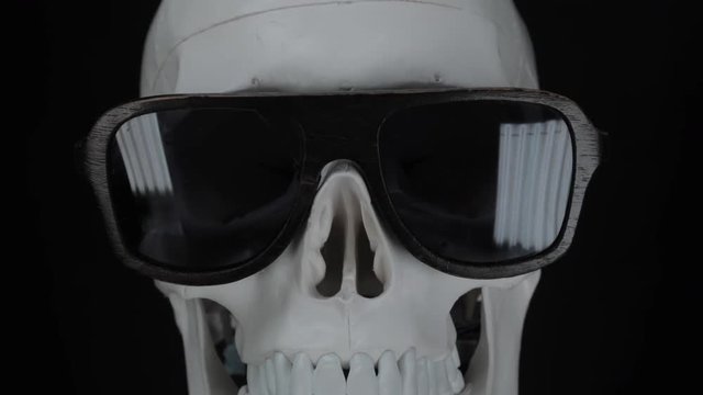 skull wearing sparkling sunglasses