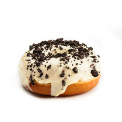 Donut with white cream and chocolate, isolated on white background. View from side.