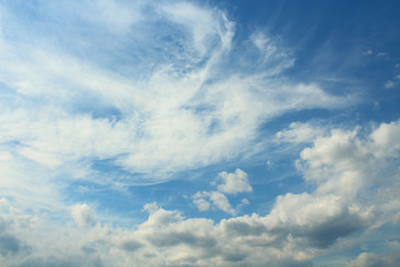 Beautiful blue sky and white cirrus and cumulus clouds. Background. Landscape.