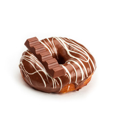 Donut with milk chocolate glaze and chocolate, isolated on white background. Viewing forty-five degrees.