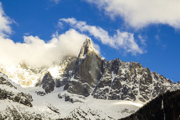 Breathtaking aerial view of Mont Blanc mountain peak covered with shiny snow, ice and glaciers...
