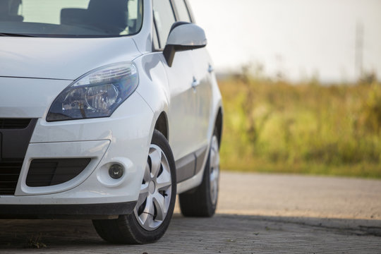 Close-up Front View Detail Of Silver New Shiny Luxurious Car Par