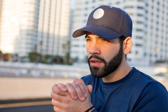 Young man getting ready to run at the streets of Miami