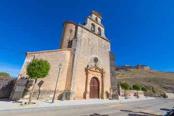 Fototapeta na wymiar church of Santa Cristina, and ruins of castle on top of the mountain, landmark and public monument in Burgo de Osma, Soria, Spain, Europe