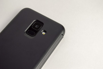 fingerprint scanner with camera and flash on a white background