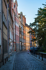Wroclaw street in the evening. Old houses at sunset.