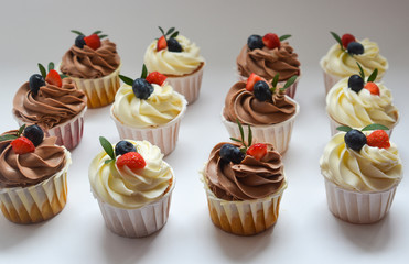 cakes with blueberries and strawberry