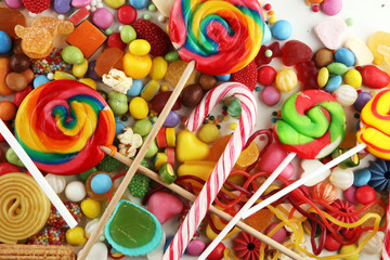 candies with jelly and sugar. colorful array of different childs sweets and treats.