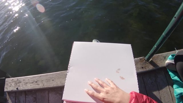 POV, eating New Zealand food on wooden dock