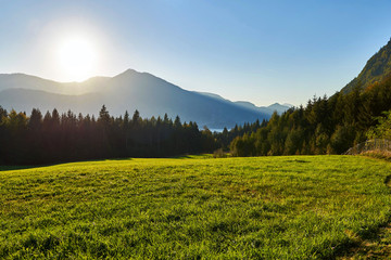 Autumn sunset lanscape in Austrian Alps with mountains and forest. Salzkammergut region.