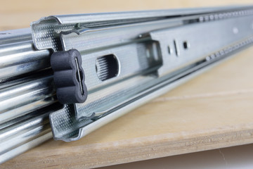 Fixing the drawer in household cabinets. Accessories for carpentry used in the construction of...