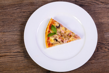 Pizza with ham and mushrooms