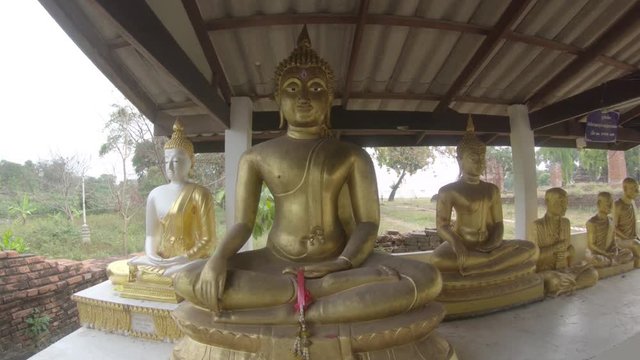 Golden Buddhist statues in Bangkok, POV