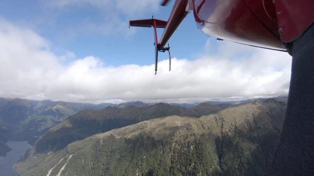 Close up POV, flying over New Zealand ridges