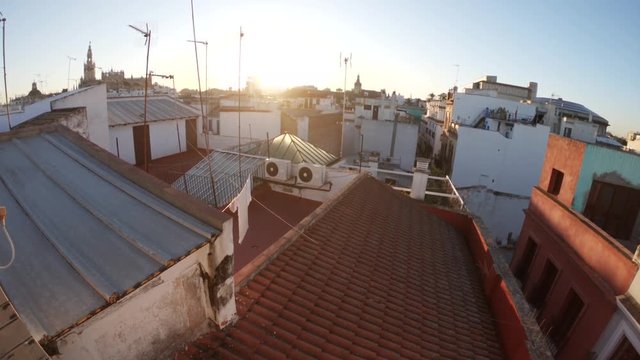 Tilt up POV, sunset overt Seville