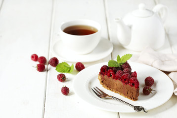 Chocolate cake with fresh raspberry.