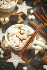 Hot chocolates with marshmallows and Christmas cookies