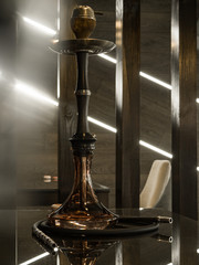Obraz na płótnie Canvas Beautiful glass hookah on a wooden table in a hookah bar.
